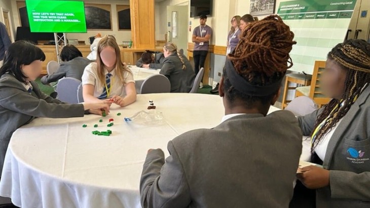 Children taking part in a table activity at the Innovation Festival