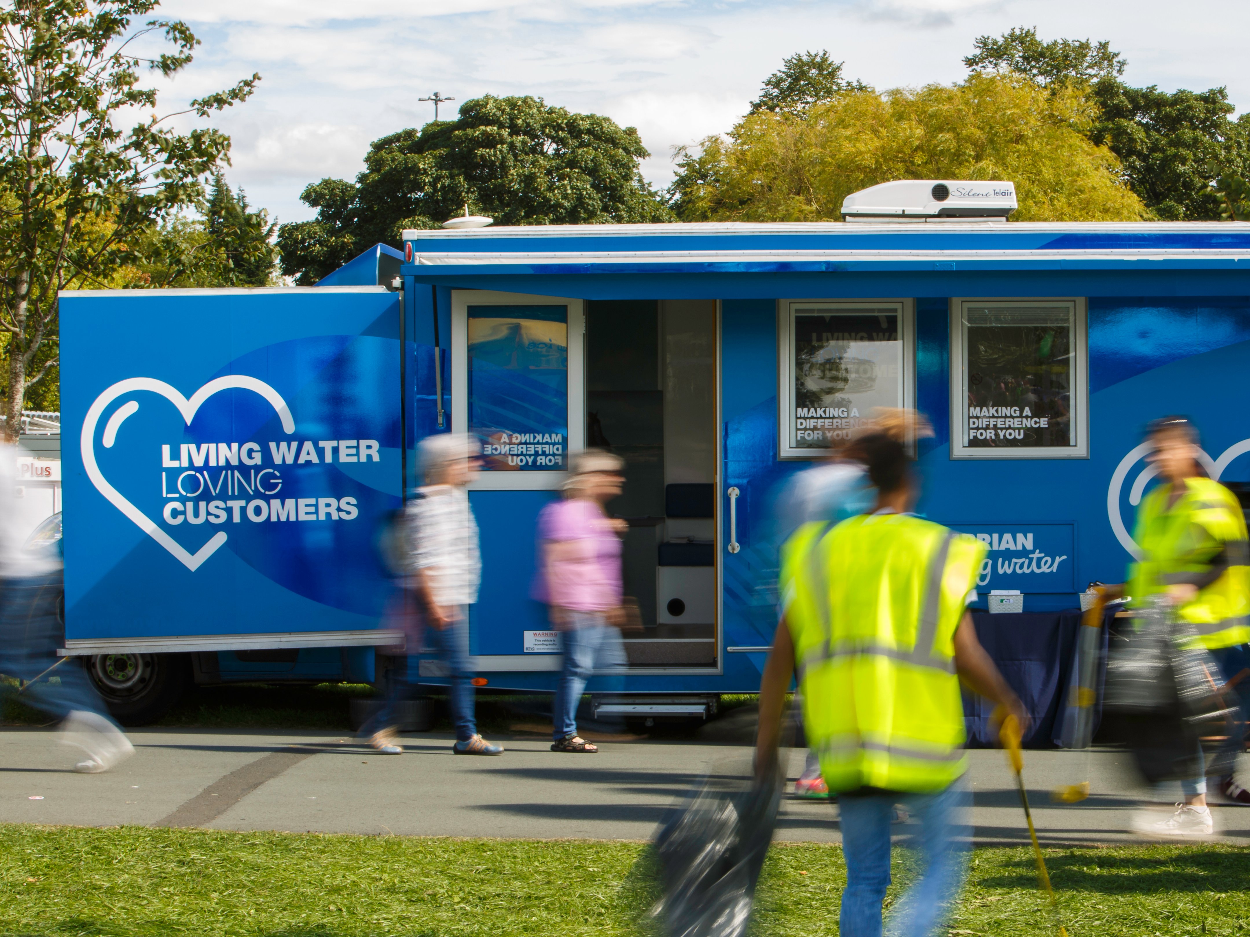 Northumbrian Water vehicle with people standing outside