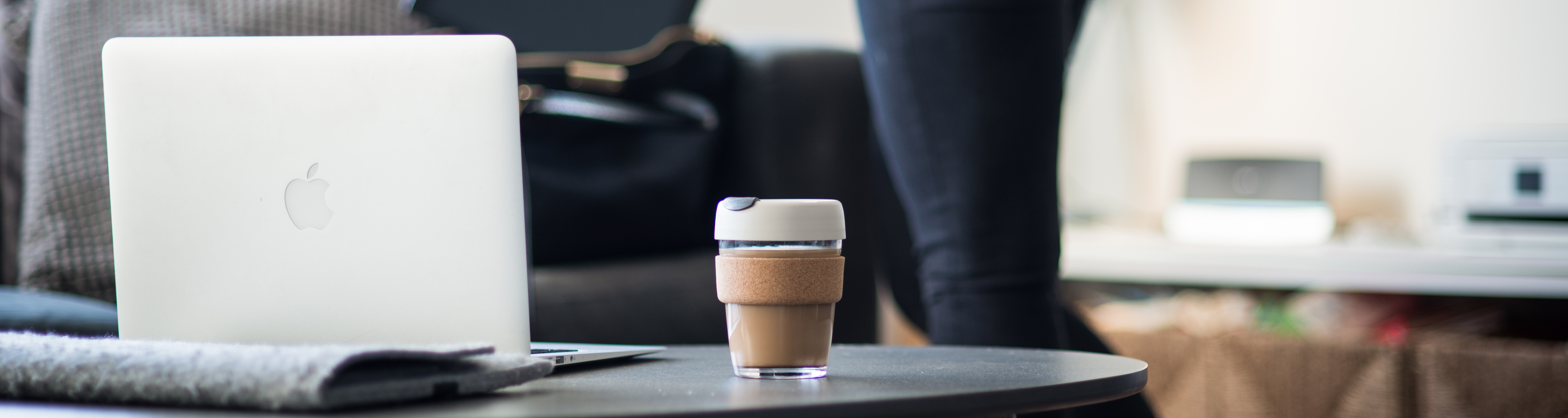 coffee and laptop on table